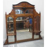 LATE VICTORIAN ROSEWOOD OVER-MANTEL MIRROR, having arched pediment over an arrangement of seven