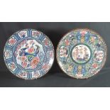 TWO SIMILAR JAPANESE WALL PLAQUES OR SHALLOW DISHES, one traditionally decorated with fantastic