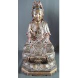 CARVED WOODEN, POLYCHROME DECORATED FIGURE OF THE BUDDHA, sitting cross legged,