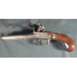 18TH CENTURY DOUBLE BARRELLED FLINTLOCK PISTOL, having two turn off 9.75cm cannon design barrels,