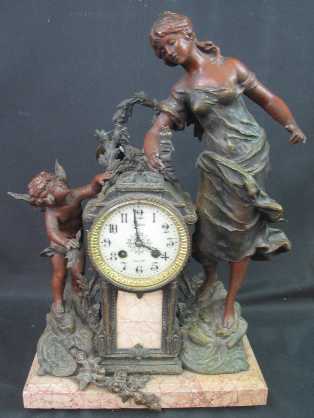 LATE 19TH CENTURY FRENCH BRONZED SPELTER FIGURAL MANTEL CLOCK, the architectural clock with enamel