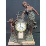 LATE 19TH CENTURY FRENCH BRONZED SPELTER FIGURAL MANTEL CLOCK, the architectural clock with enamel