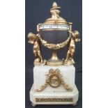 FRENCH ORMOLU AND WHITE MARBLE 'CERCLE TOURNANTS' URN SHAPED, CHERUB MOUNTED MANTEL CLOCK,