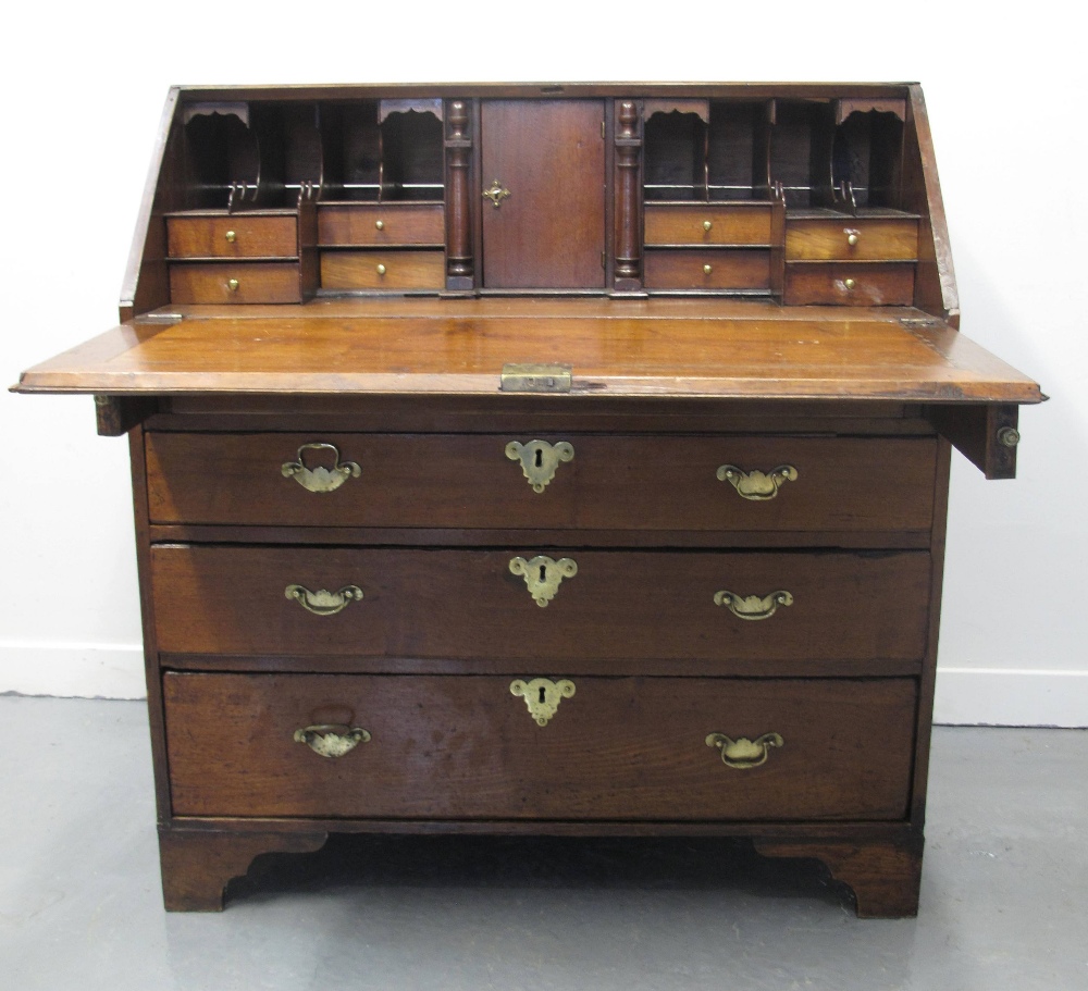 18TH CENTURY MAHOGANY FALL FRONT BUREAU of small proportions, the framed fall revealing stepped