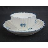 18TH CENTURY FIRST PERIOD WORCESTER PORCELAIN GILLY FLOWER PATTERN FLUTED CUP AND SAUCER, the