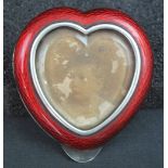 SILVER AND RED GUILLOCHE ENAMEL HEART SHAPED PHOTOGRAPH FRAME with hinged section to the back,