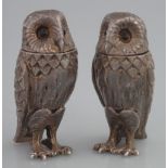 PAIR OF SILVER CONDIMENTS IN THE FORM OF OWLS with glass eyes, detailed plumage and removable