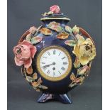 LATE 19TH CENTURY STAFFORDSHIRE MAJOLICA TWO HANDLED FLASK SHAPED CLOCK, the cover and body relief