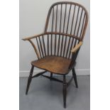 19TH CENTURY ASH AND ELM PRIMITIVE HOOP BACKED FIRESIDE ARMCHAIR, having moulded slab seat on turned