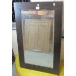 Oak framed rectangular bevel plate mirror. (B.P. 24% incl.