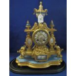 19th Century French gilt metal architectural mantel clock with porcelain panels and urn shaped