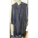 Black silk and lace vintage 1920's long sleeved flapper dress with black lace panel to front and