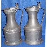 Pair of large pewter Tappit Hen type pot bellied, lidded flagons. Flower head touch marks to bases.