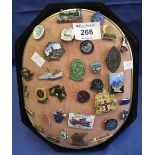 Octagonal badge and pin stand with assorted enamel and other badges to include: Sydney,