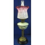 Early 20th Century brass double burner oil lamp with ceramic reservoir,