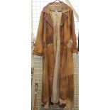 Long brown western style ladies' leather and cowhide coat with Silvano label inside.