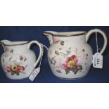 Two similar Coalport porcelain white ground, baluster shaped jugs,