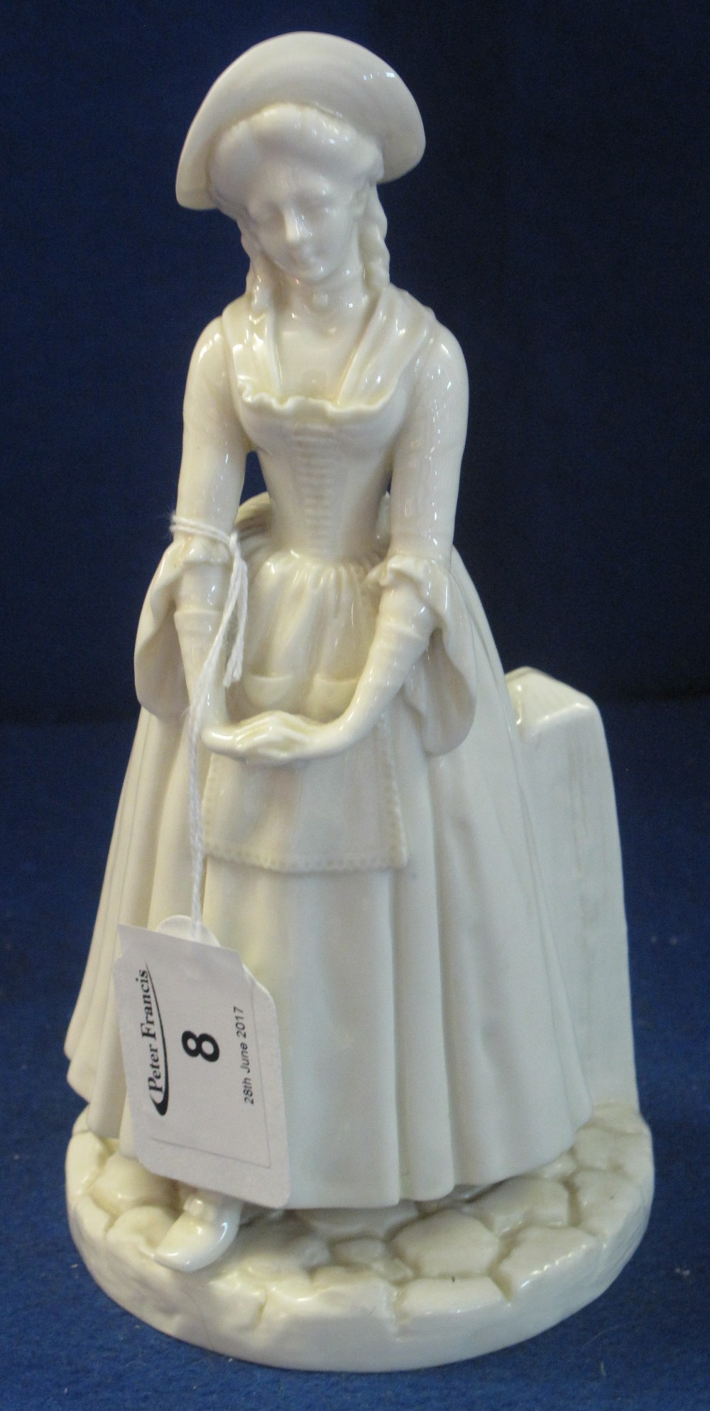 Royal Worcester porcelain figurine of a standing crinoline lady.