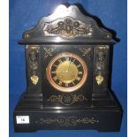 Late 19th Century black slate, architectural, metal mounted, two train mantel clock,