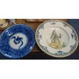 Large Delft faience dish or charger with figure of lady holding a flower together with a Delft blue