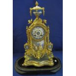 19th Century French Ormolu architectural mantel clock with porcelain, urn shaped finial,