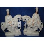 Pair of 19th Century Staffordshire Pottery flat backed equestrian figures,