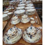 Six trays of Staffordshire 'Alexandra' opaque china dinnerware on white ground with swag and floral