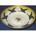 Royal Worcester porcelain shallow bowl decorated with a continuous band of black swans in flight