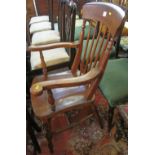 Ash and elm spindle back open kitchen armchair. (B.P. 24% incl.