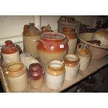 Collection of various mainly stoneware flagons to include: James Williams,