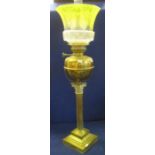 Early 20th Century brass oil lamp with brass reservoir on a Corinthian column stepped,