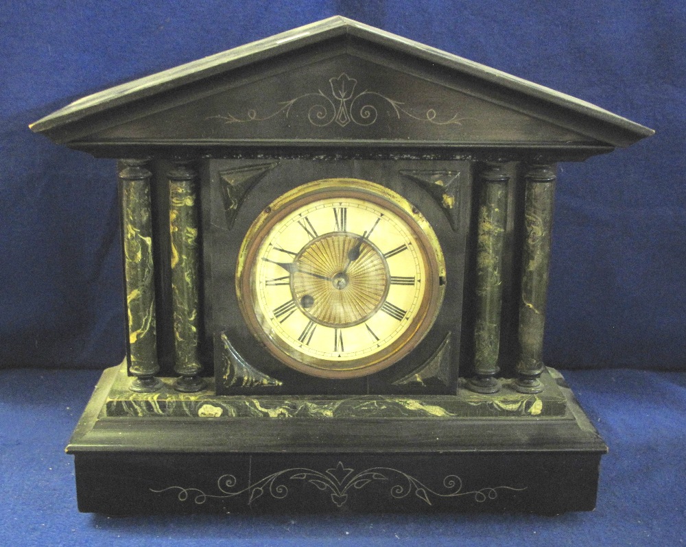 Late 19th Century ebonised wooden architectural single train wall clock with painted marbling.