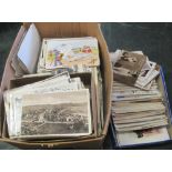 Box of loose postcards, topographical, greetings, humorous, including Lawson Wood Gran Pop Series.