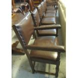 Set of six 17th Century style oak dining chairs with leatherette upholstery and metal stud work.