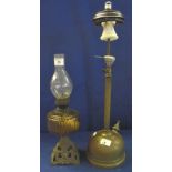 Early 20th Century brass single burner oil lamp with coloured glass reservoir and pierced cast