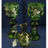 Pair of Mary Gregory type enamelled green glass, urn shaped vases on stands with cherub decoration,