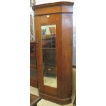 Early 20th Century oak mirror door corner wardrobe. (B.P. 24% incl.