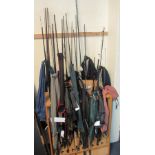 Large collection of modern carbon fly fishing rods and others, various, all having fabric cases.