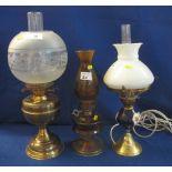 A group of three assorted oil lamps, one converted for electricity,