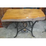 Rustic oak occasional table on cast iron base. (B.P. 24% incl.