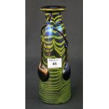 A Loetz style iridescent multicoloured drawn and banded bottle shaped vase with applied relief