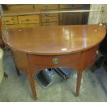 Mahogany D ended side table with brass gallery top on square legs and brass casters. (B.P. 24% incl.
