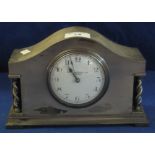 Mid century silver plated arched mantle clock with circular enamel Arabic dial marked Braningtons