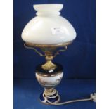 20th Century oil lamp converted to electricity with hunting design reservoir and cream shade. (B.P.