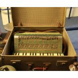 Suitcase containing a Rauner Concerto accordion. (B.P. 24% incl.