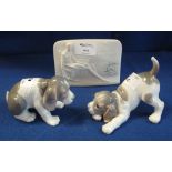 Two Lladro studies of dogs together with Lladro Collectors Society shell design plaque depicting