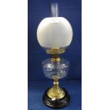 Early 20th Century oil burner with clear glass reservoir and frosted shade. (B.P. 24% incl.