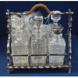 Electoplated bamboo design six section cruet stand with glass containers. (B.P. 24% incl.