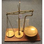 Set of brass pillar scales with trays and weights on marble platform base. (B.P. 24% incl.