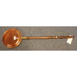 19th Century copper warming pan with turned handle. (B.P. 24% incl.